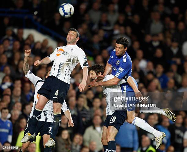 Chelsea's German footballer Michael Ballack challenges for the ball with Bolton Wanderers' Paul Robinson during their Premier League football match...