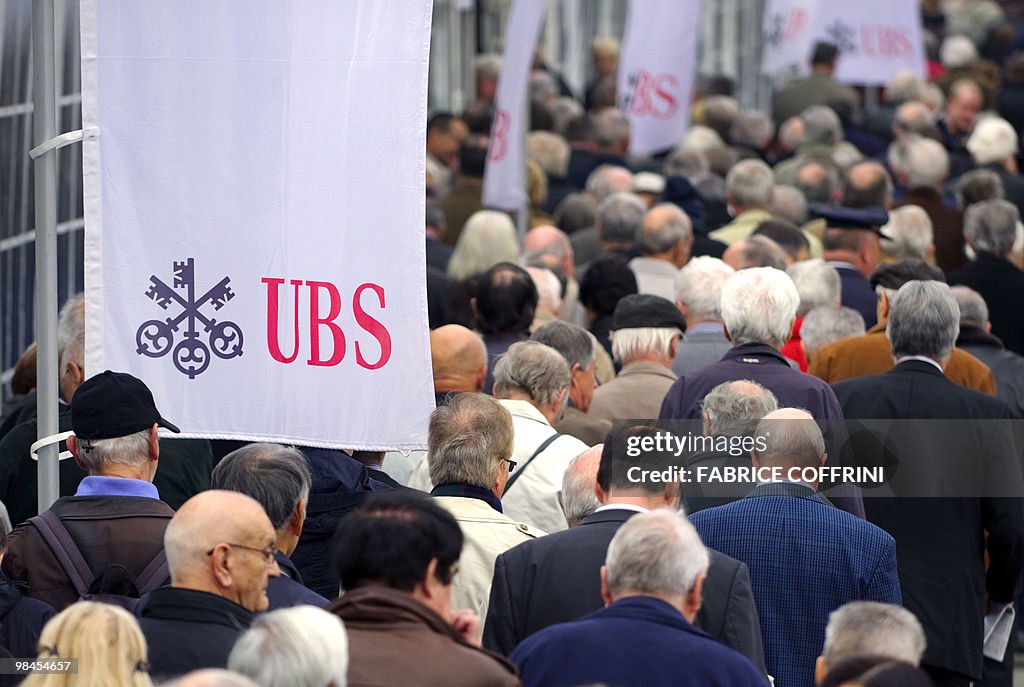 Shareholders arrive for the annual gener