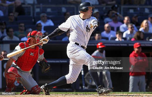 Nick Johnson of the New York Yankees follows through on a eighth inning RBI single against the Los Angeles Angels of Anaheim on April 14, 2010 at...