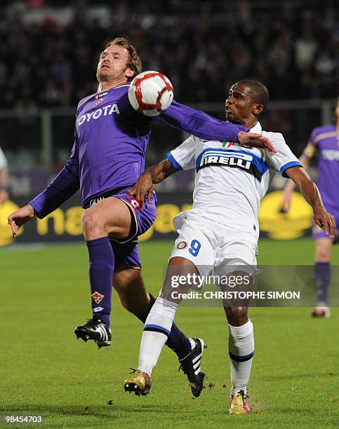 Inter Milan's Cameroonian forward Samuel Eto'o vies with Fiorentina's defender Cesare Natali during their Italian semifinal second leg football match...