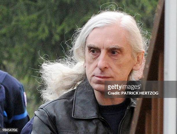 Former militant of the French far-left group Action Directe, Georges Cipriani arrives while wearing handcuffs at the open prison in...