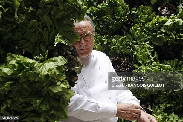 French chef Alain Ducasse poses on April 13, 2010 at the Plaza Athenee hotel in Paris. Butchers, dairy-farmers, fruit-growers and fishermen -- star...