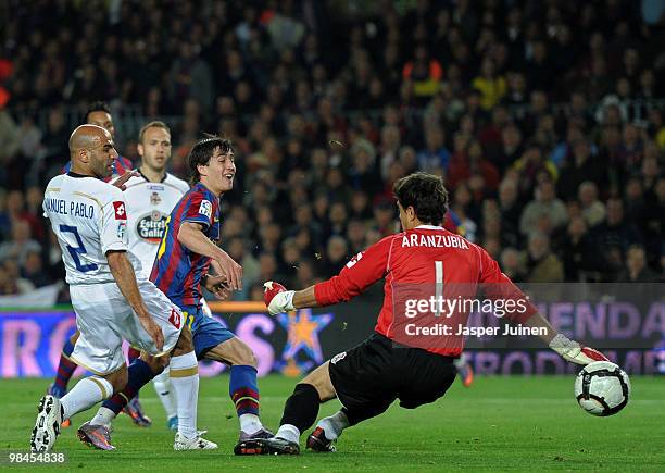 Bojan Krkic of FC Barcelona scores his sides opening goal past goalkeeper Daniel Aranzubia of Deportivo la Coruna during the La Liga match between...