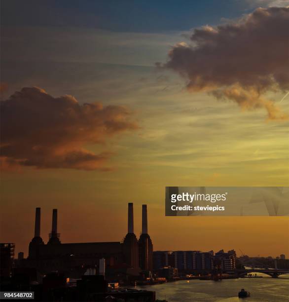 battersea power station - battersea power station silhouette stock-fotos und bilder