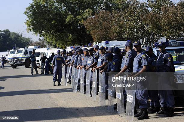 Police stand guard front of the Ventersdorp's court on April 14, 2010. The accused murderers of South African white supremacist Eugene Terre'Blanche...