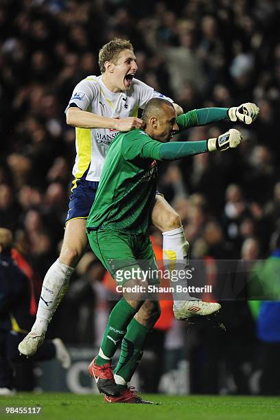 Michael Dawson of Tottenham Hotspur celebrates with goalkeeper Heurelho Gomes after the Barclays Premier League match between Tottenham Hotspur and...