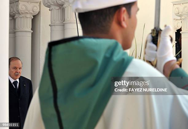 Algerian President Abdelaziz Bouteflika waits for the arrival of his Vietnamese counterpart Nguyen Minh Triet on April 14, 2010 in Algiers. Triet and...