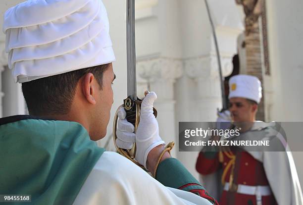 Algerian presidential guards are seen on duty during the meeting of their President Abdelaziz Bouteflika with his Vietnamese counterpart Nguyen Minh...