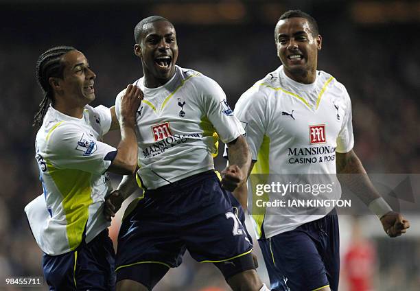 Tottenham Hotspurs Danny Rose celebrates scoring his goal against Arsenal with Tottenham Hotspurs Cameroon player Benoit Assou-Ekotto and Tottenham...