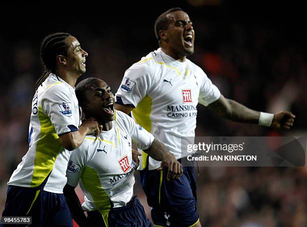 Tottenham Hotspurs Danny Rose celebrates scoring his goal against Arsenal with Tottenham Hotspurs Cameroon player Benoit Assou-Ekotto and Tottenham...