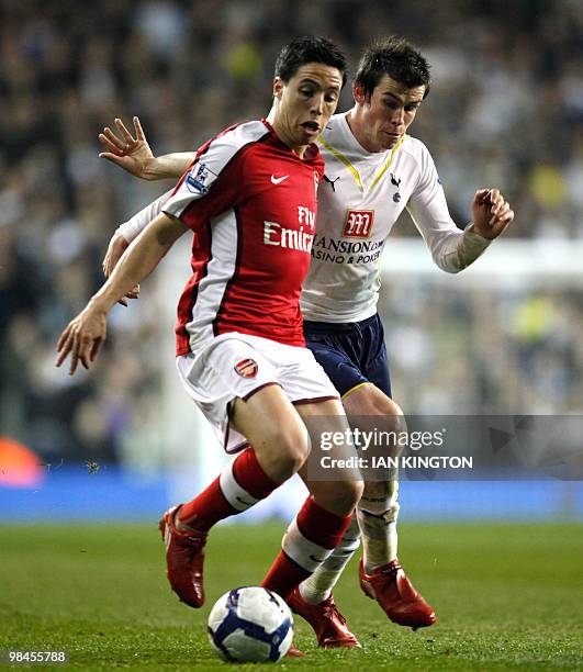 Arsenal's French player Samir Nasri vies with Tottenham Hotspurs Gareth Bale during a Premier League match at White Hart Lane in London on April 14,...