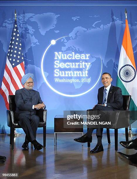 President Barack Obama takes part in a bilateral meeting with Indian Prime Minister Manmohan Singh at Blair House on the sidelines of the Nuclear...