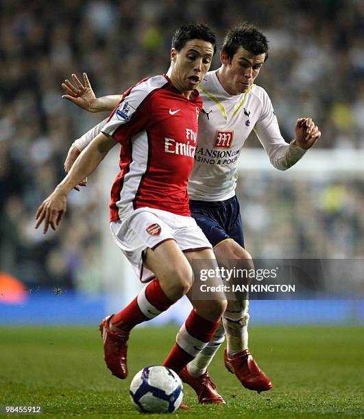 Arsenal's French player Samir Nasri vies with Tottenham Hotspurs Gareth Bale during a Premier League match at White Hart Lane in London on April 14,...