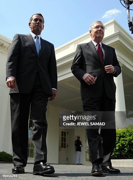 House Minority leader John Boehner, R-OH and Senate Minority leader Mitch McConnell, R-KY, arrive to speak to reporters following their meeting with...