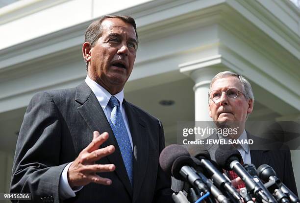 House Minority leader John Boehner, R-OH speaks as Senate Minority leader Mitch McConnell, R-KY, looks on following their meeting with US President...