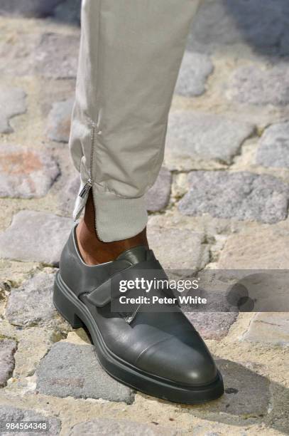 Model, shoe detail, walks the runway during the Hermes Menswear Spring/Summer 2019 show as part of Paris Fashion Week on June 23, 2018 in Paris,...