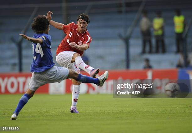 Brazil's Internacional Giuliano vies for the ball with Ecuador's Emelec Enner Valencia during their Copa Libertadores 2010 football match at George...