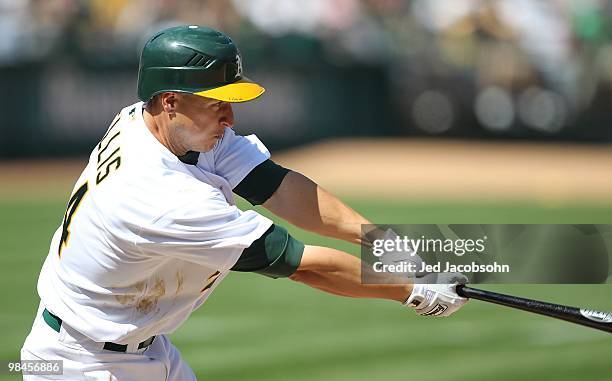 Mark Ellis of the Oakland Athletics bats against the Seattle Mariners during an MLB game at the Oakland-Alameda County Coliseum on April 8, 2010 in...