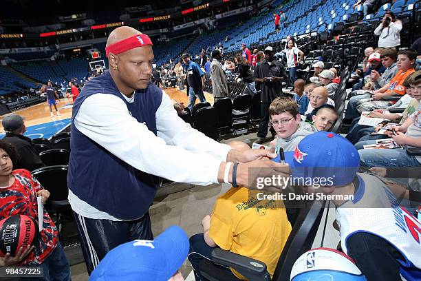 Charlie Villanueva of the Detroit Pistons meets with children with Alopecia and their families prior to the game against the Minnesota Timberwolves...