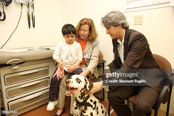 Patient Emily Santana, Nurse Practioner,Dr. Steven Wolf with Gracie the Dalmatian of '101 Dalmatians' the Musical during Gracie's visit to...