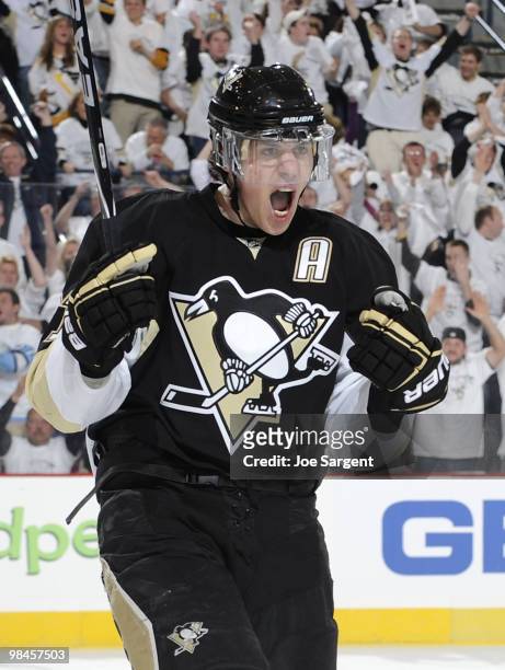 Evgeni Malkin of the Pittsburgh Penguins celebrates his second goal of the game against the Ottawa Senators in Game One of the Eastern Conference...