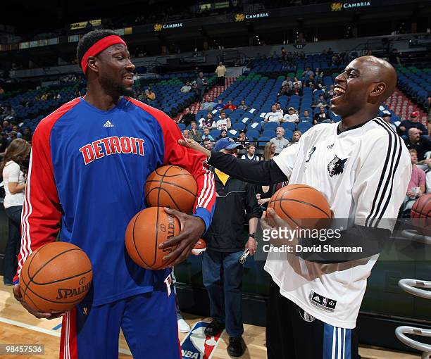 Damien Wilkins of the Minnesota Timberwolves shares a laugh with Ben Wallace of the Detroit Pistons prior to the game on April 14, 2010 at the Target...