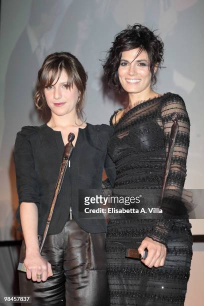Actresses Isabella Ragonese and Valeria Solarino show their awards during the "2010 Premio Afrodite" cerimony at the Studios on April 14, 2010 in...