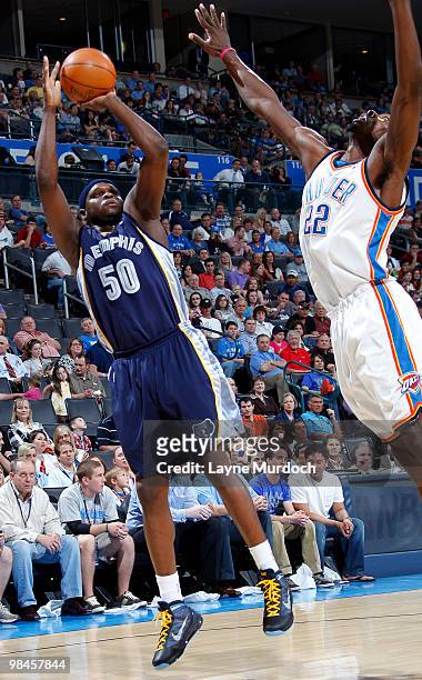 Zach Randolph of the Memphis Grizzlies puts up a shot against Jeff Green of the Oklahoma City Thunder on April 14, 2010 at the Ford Center in...