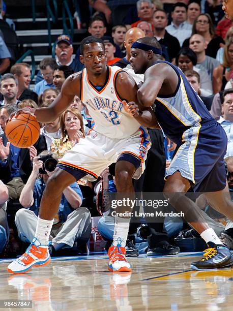 Jeff Green of the Oklahoma City Thunder drives past Zach Randolph of the Memphis Grizzlies on April 14, 2010 at the Ford Center in Oklahoma City,...