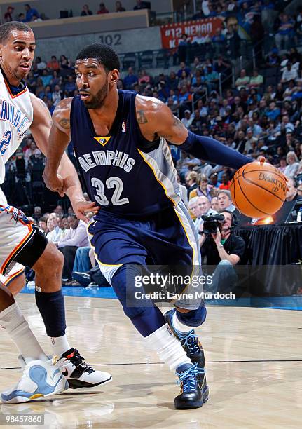 Mayo of the Memphis Grizzlies drives past Thabo Sefolosha of the Oklahoma City Thunder on April 14, 2010 at the Ford Center in Oklahoma City,...