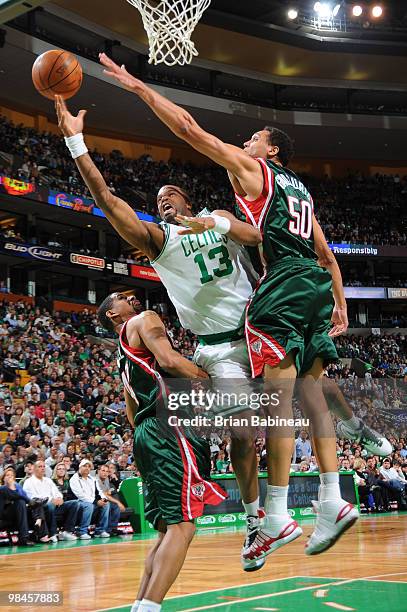 Sheldon Williams of the Boston Celtics drives to the basket against Dan Gadzuric of the Milwaukee Bucks on April 14, 2010 at the TD Garden in Boston,...