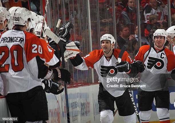 Mike Richards of the Philadelphia Flyers scores a second period goal on an assist from Ian Laperriere during the second period against the New Jersey...