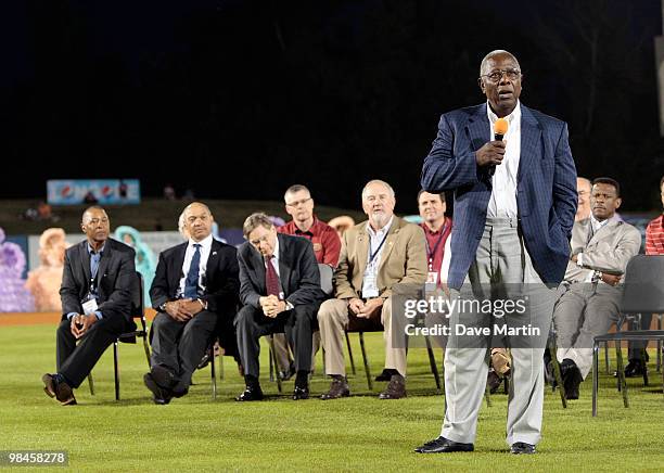 Baseball Hall of Famer Hank Aaron speaks during pre-game ceremonies following the opening the Hank Aaron Museum at the Hank Aaron Stadium on April...