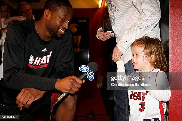Dwyane Wade of the Miami Heat interviews little fan on April 14, 2010 at American Airlines Arena in Miami, Florida. NOTE TO USER: User expressly...
