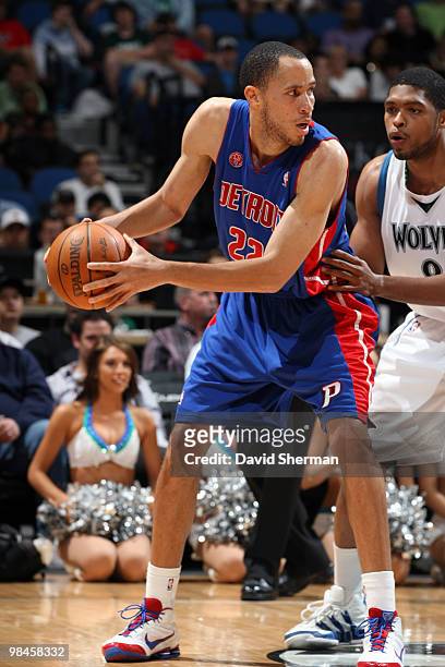 Tayshaun Prince of the Detroit Pistons looks to pass the ball under pressure from Ryan Gomes of the Minnesota Timberwolves during the game on April...