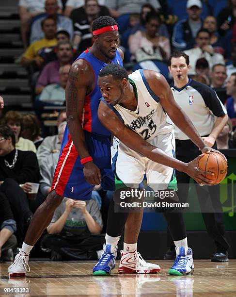 Al Jefferson of the Minnesota Timberwolves looks to move the ball against Ben Wallace of the Detroit Pistons during the game on April 14, 2010 at the...