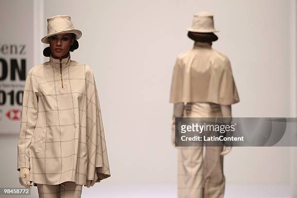 Model displays a design by Edgardo Luengas during the third day of Mercedes-Benz Fashion Week at Campo Marte on April 14, 2010 in Mexico City, Mexico.