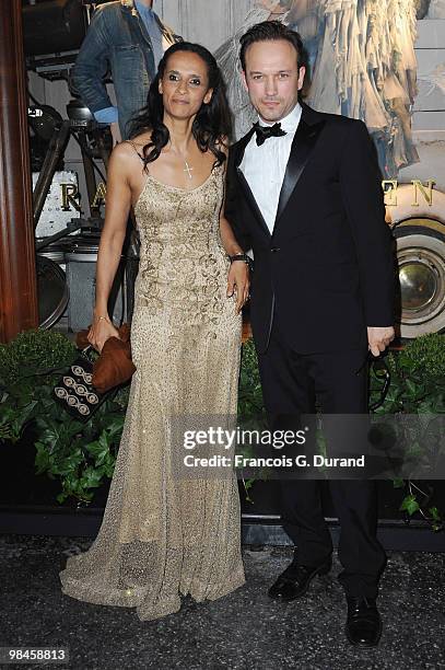 Vincent Perez and Carine Silla arrive to the Ralph Lauren dinner to celebrate the opening of the flagship on April 14, 2010 in Paris, France.