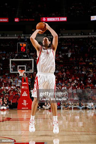 Luis Scola of the Houston Rockets shoots the ball against the New Orleans Hornets on April 14, 2010 at the Toyota Center in Houston, Texas. NOTE TO...