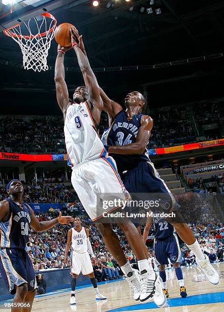 Serge Ibaka of the Oklahoma City Thunder goes for the shot against Hasheem Thabeet of the Memphis Grizzlies on April 14, 2010 at the Ford Center in...