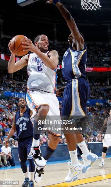 Thabo Sefolosha of the Oklahoma City Thunder does for a layup past Hasheem Thabeet of the Memphis Grizzlies on April 14, 2010 at the Ford Center in...