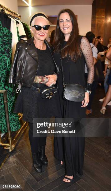 Amanda Eliasch and Emma and the Sound attend the launch of Amanda Wakeley x Eve De Haan's 'ART' exhibition on June 26, 2018 in London, England.