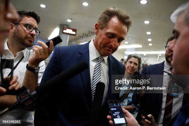 Sen. Jeff Flake speaks with reporters ahead of the weekly policy luncheons at the U.S. Capitol June 26, 2018 in Washington, DC. Lawmakers are...