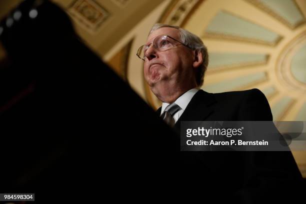 Senate Majority Leader Mitch McConnell speaks with reporters following the weekly policy luncheons at the U.S. Capitol June 26, 2018 in Washington,...