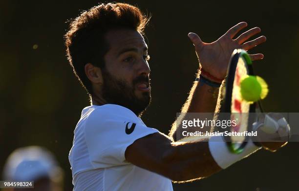 Salvatore Caruso of Italy plays a forehand against Stefano Napolitano of Italy during Wimbledon Championships Qualifying - Day 2 at The Bank of...