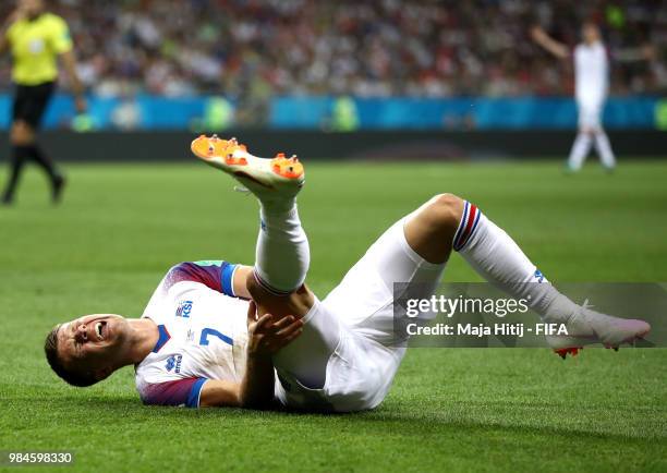 Johann Gudmundsson of Iceland goes down injured during the 2018 FIFA World Cup Russia group D match between Iceland and Croatia at Rostov Arena on...