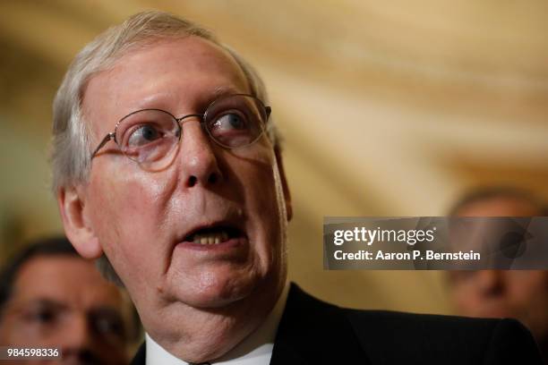 Senate Majority Leader Mitch McConnell speaks with reporters following the weekly policy luncheons at the U.S. Capitol June 26, 2018 in Washington,...