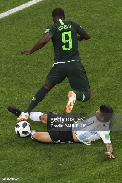 Nigeria's forward Odion Jude Ighalo vies for the ball with Argentina's defender Nicolas Otamendi during the Russia 2018 World Cup Group D football...