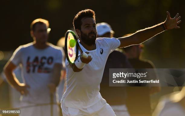 Salvatore Caruso of Italy plays a forehand against Stefano Napolitano of Italy during Wimbledon Championships Qualifying - Day 2 at The Bank of...