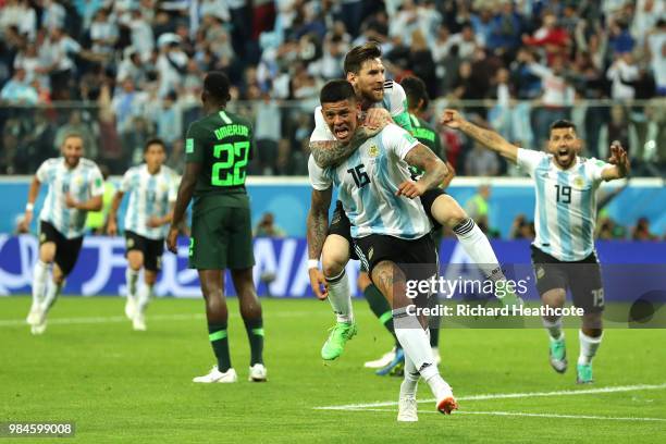 Marcos Rojo of Argentina celebrates after scoring his team's second goal with teammate Lionel Messi during the 2018 FIFA World Cup Russia group D...